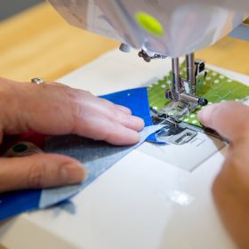 Sewing with a scrap leader and a scrap finisher