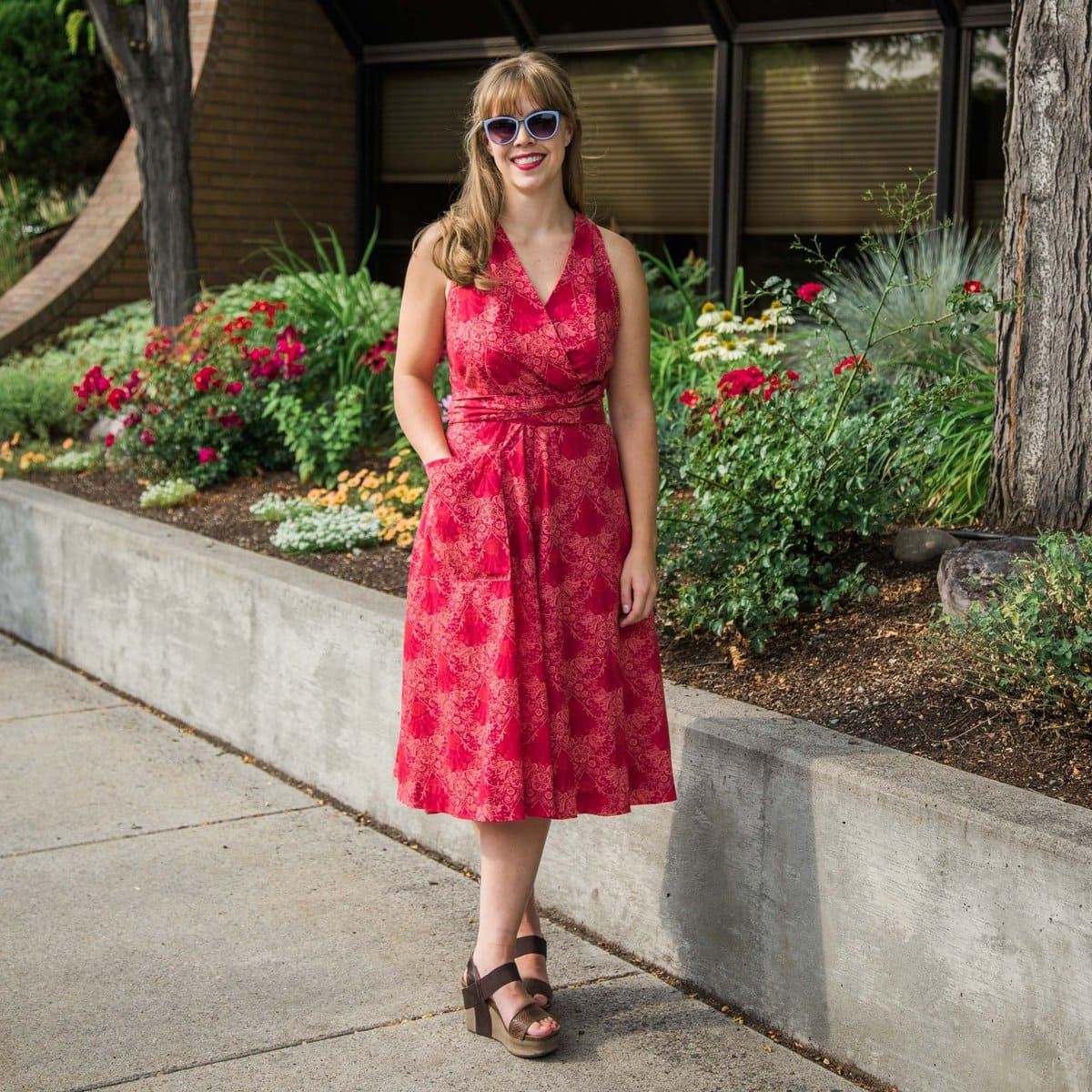 The Decades of Style Siren Sundress in the Blooming Garland Poplin in Red